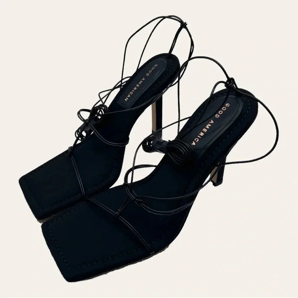 0203. NEW IN BOX GOOD AMERICAN CAGED SLANTED SANDALS BLACK IN COLOR‎ SIZE 9